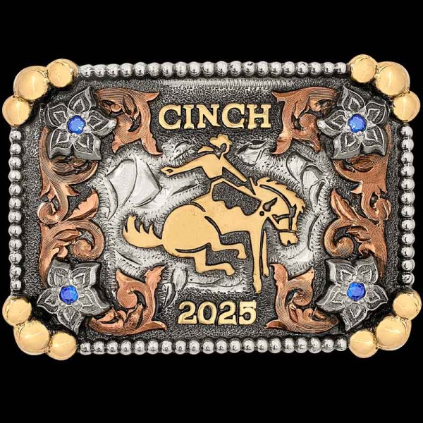 "We turned our iconic County Fair Belt Buckle into a peewee version! Handcrafted on a German Silver base with a German Silver berry and Jeweler’s Bronze 5-bead edge, it features hand-engraved Copper scrolls, Jeweler’s Bronze lettering, and flowers ac